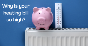 A piggy bank and thermometer on a radiator